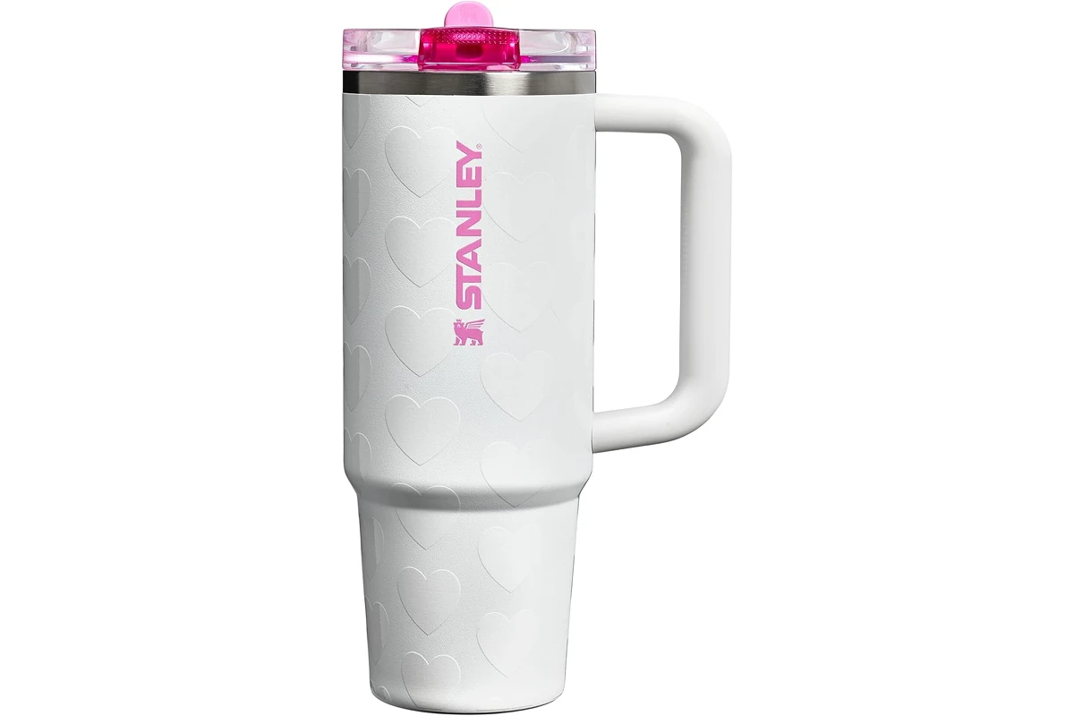 White insulated mug with pink lid and logo.