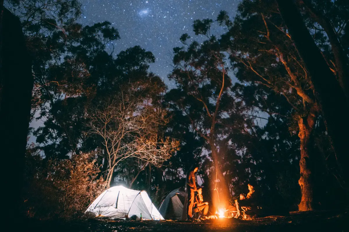 Camping under a starry night sky.