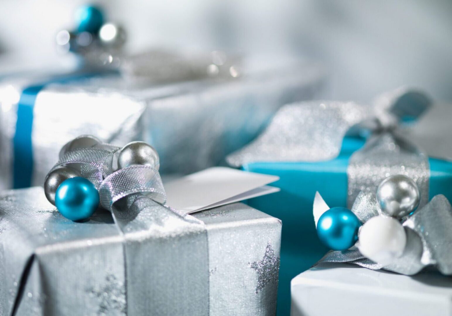 Silver and blue gift boxes with ornaments